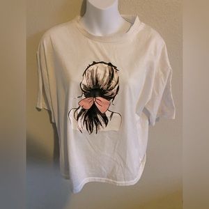 Girl with hair pulled back with a bowtie